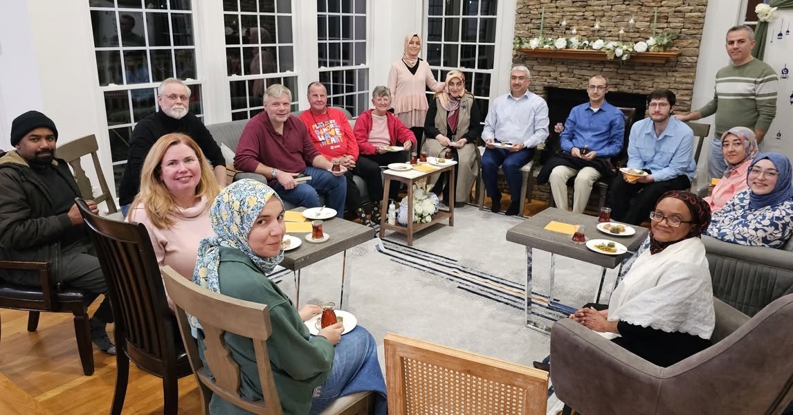 Quran-Bible Conversation group discussing fasting traditions during a Scripture Reasoning Iftar
