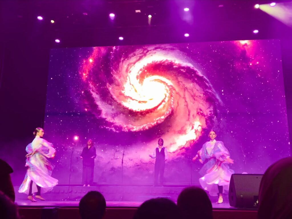 Young performers and speakers gathered on stage for the closing moments of the Symphony of the Earth festival
